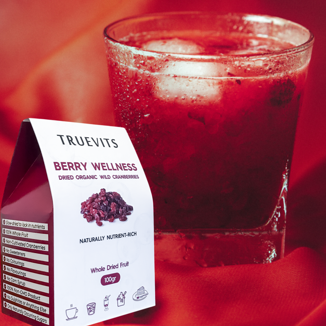 cranberry-drink-in-a-glass-withwhole-dried-fruit-truevits-berry-wellness-dried-organic-wild-cranberry-in-white-box