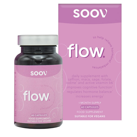 A bottle of SOOV flow menstrual supplements with 60 capsules, alongside its packaging box. The product packaging is primarily pink with white text, and the bottle is transparent with capsules visible inside.